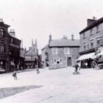 View of belper Market Place in the 1890s with St Peter's church in the background.